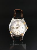 Gentleman's Automatic Breitling Wings date watch. The case is stainless steel screw back. There is a