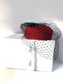 A Dior Boutique rabbit felt pillbox hat with applied grey pearlescent beads, striking green bow