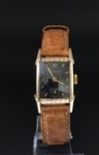 Vintage Wittneuer wrist watch, black rectangular dial with gold baton and Arabic numeral hour