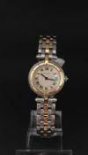 Ladies bi colour Cartier, circular dial with Roman numerals, model number 06042