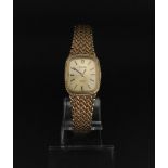 Ladies Tudor Geneve bracelet watch, rectangular cushion dial, yellow metal case and integrated