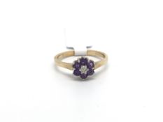 Amethyst and diamond cluster ring, 0.05ct diamond set with a cluster of round cut amethyst, in