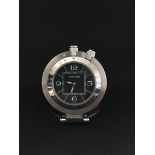 Cartier Desk Clock, black dial, folding steel case, 54mm diameter, quartz