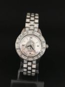 Ladies automatic Dior Diamond Bezel and dial. The case and bracelet is stainless steel. The watch is