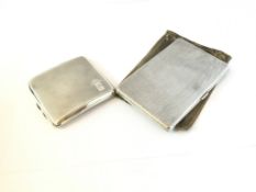 A silver engine turned cigarette case, hallmarked Birmingham 1947, togther with another cigarette