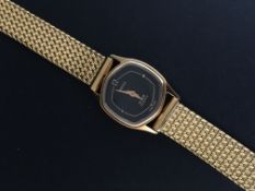 Ladies Omega De Ville watch. The watch is a gold plated with a stainless steel back. The movement is