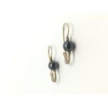 Hematite bead earrings, yellow french wire fittings, in yellow metal stamped and tested as 9ct