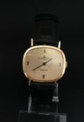 Gents 14 Carat Gold Baume & Mercier wrist watch. The dial is signed Tiffany & co. The movement is