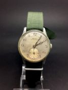 Gentleman's Doxa military watch. The middle case is aluminum and has fixed bars. The movement is a