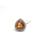 Heart cut Citrine and diamond ring, 12x12mm heart cut citrine set with a border of brilliant cut