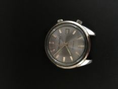 Gentleman's Citizen Alarm Date watch. The case is stainless steel and it has a manual wind 21