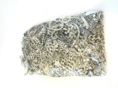 A large quantity of mostly silver chains and bracelets, approximately 5488g gross