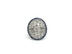 Art Deco diamond and sapphire oval panel ring, centre old and transitional cut diamonds set within a