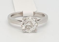Single stone diamond ring, old cut diamond weighing an estimated 1.50cts, four claw set in platinum,