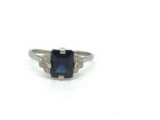 Sapphire and diamond deco ring, rectangular cut sapphire with diamond set stepped shoulders, in