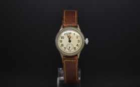 Gentlemen's military WW2 USA manual wind Elgin wristwatch. The case is base metal with chrome