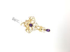 Amethyst and white paste set nouveau pendant, gold detail and bow drop with suspended pear cut