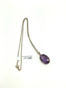 Amethyst pendant, 18x12mm oval cut amethyst claw set, with a 38cm chain, all in yellow metal stamped