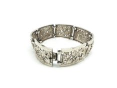 Silver openwork floral link bracelet, stamped 835