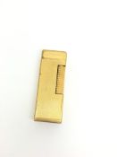 Dunhill lighter, gilt case, marked inside USA PAT
