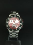 Gentleman's Red Tag Heuer Chronograph wrist watch. The case and bracelet is stainless steel. The