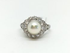 Pearl and diamond cluster ring, 7.25mm pearl set within a cluster of brilliant cut diamonds,