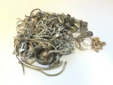Bag of mostly silver, including charm bracelets and bangles, gross weight approximately 2306 grams
