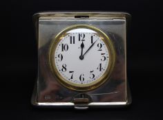 Silver cased traveling clock by Cohen & Charles, White dial with Arabic numerals, marked '8 Day',