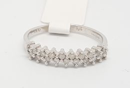 Diamond set half eternity ring, two rows of round brilliant cut diamonds weighing an estimated total