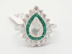 Art Deco style emerald and diamond ring, central pear rose cut diamond weighing an estimated 0.