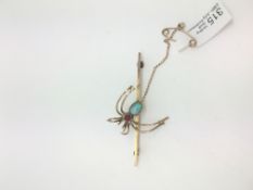 Opal and garnet set spider brooch, 7x5mm blue/green opal set with a round cut garnet,