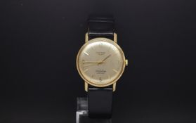 Gentlemen's 9ct Gold Longines Flagship wristwatch. The movement is 17 jewel automatic. The dial is