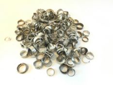 Bag of mostly silver rings, gross weight approximately 902 grams