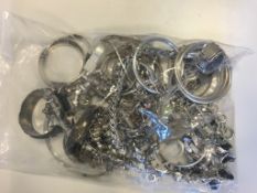 Bag of mostly silver, including charm bracelets and bangles, gross weight approximately 1564 grams