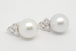 South Sea pearl and diamond earrings, 14mm South Sea pearl set under three round brilliant cut