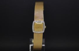 Ladies' vintage L.U.C - Chopard wristwatch, 18ct and diamond set, champagne dial with baton hour