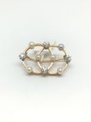 Diamond and pearl double circle brooch, six pearls set with four old cut diamonds, estimated diamond