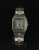 Cartier Tank automatic wristwatch, Square dial with Roman numerals, date aperture to 3 o'clock