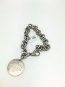 Tiffany & Co silver bracelet, circular charm with lobster clasp