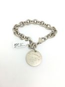 Tiffany & Co silver bracelet, circular charm with lobster clasp