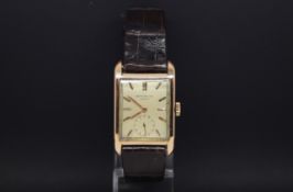 Gentlemen's Patek Philippe 18ct rose gold wristwatch, rectangular silvered dial with baton hour