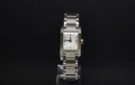 Ladies Baume & Mercier, rectangular dial, baton and Arabic numeral hour markers, stainless steel