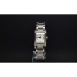 Ladies Baume & Mercier, rectangular dial, baton and Arabic numeral hour markers, stainless steel