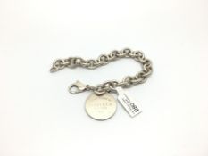 Tiffany & Co silver bracelet, circular charm with lobster clasp