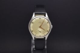 A GENTLEMANS OVERSIZED OMEGA STAINLESS STEEL WRIST WATCH. Circa 1950s. It has a cream coloured