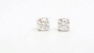 Single stone diamond ear studs, round brilliant cut diamonds weighing an estimated total of 1.01cts,