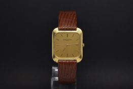 A GENTLEMANS VACHERON CONSTANTIN WRIST WATCH. Circa 1980s. The dial is gold in colour with gold onyx