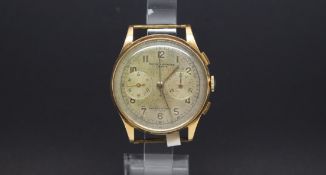 An OVERSIZED GENTLEMENS 18ct Gold BAUME & MERCIER CHRONOGRAPH WRIST WATCH. Circa 1940s. The dial has