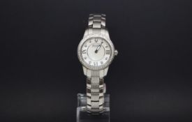 Ladies diamond Bulova Accutron, mother of pearl dial, diamond hour markers and bezel, stainless