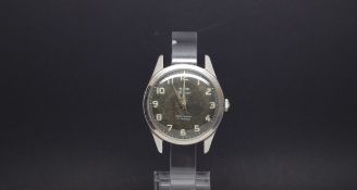 A GENTLEMEN'S W10 MILITARY HMT STAINLESS STEEL WRIST WATCH, black dial with luminous markers and